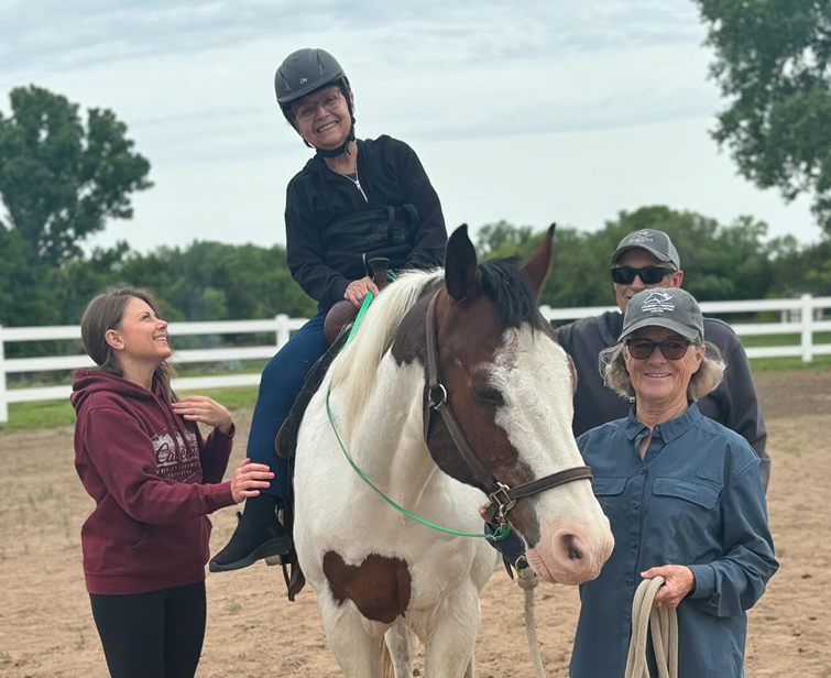 people with white horse