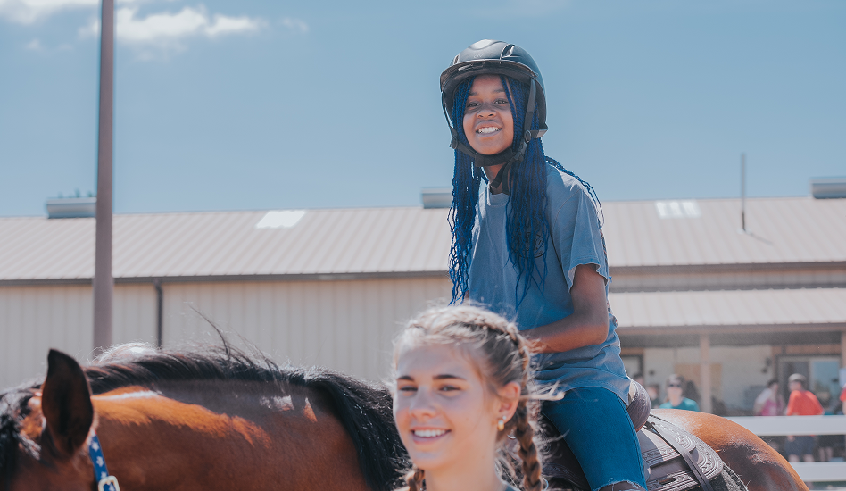 Girl riding Horse