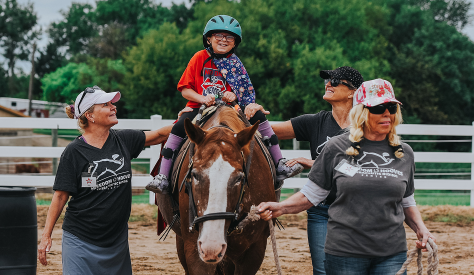 People in cap with Horse